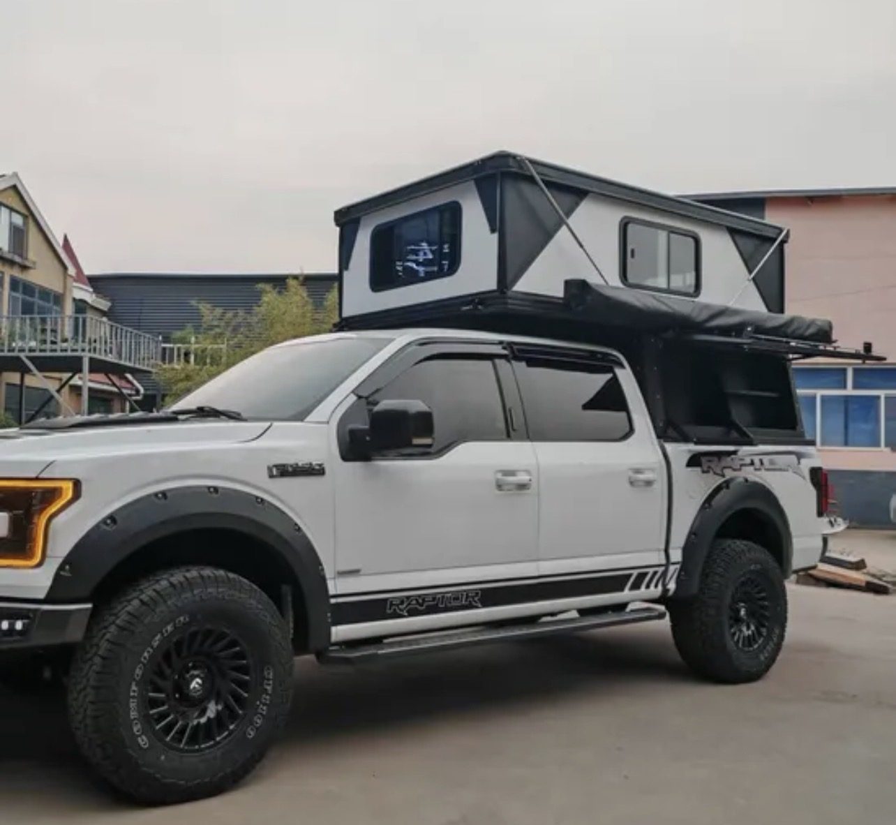 White Raptor with camper